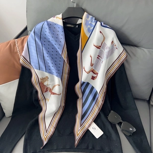 Orange horse print diamond silk scarf with geometric blue and yellow patterns