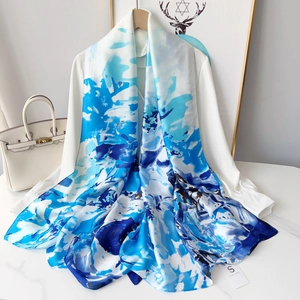 Elegant lightweight blue and white silk scarf shawl for sun protection and beach fashion