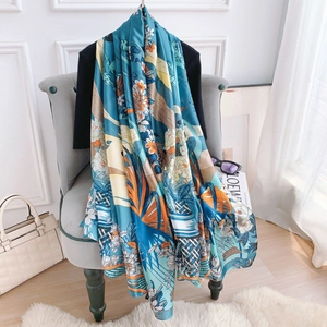 Elegant floral print silk-feel scarf shawl in peacock blue with bohemian patterns