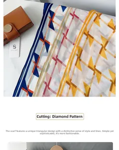 Détail d'un foulard en soie à motifs géométriques avec une coupe en losange élégante