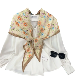 Floral breathable silk scarf for women paired with a white shirt and stylish sunglasses