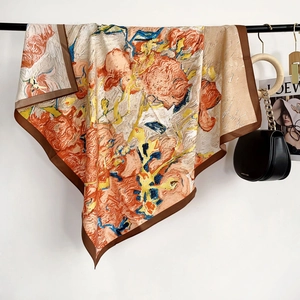 Detail of artistic oil painting floral silk scarf with soft twill texture and warm tones