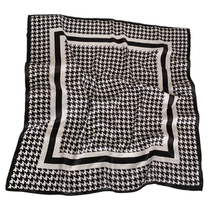 Classic black and white houndstooth square scarf with a smooth velvet-like finish