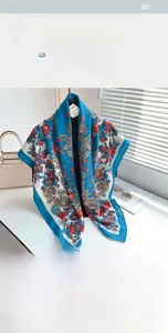 Detail of 110cm blue bohemian silk scarf with herringbone weave and paisley floral pattern