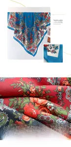 Detail of red floral paisley polyester scarf showing fine twill weave and vibrant patterns