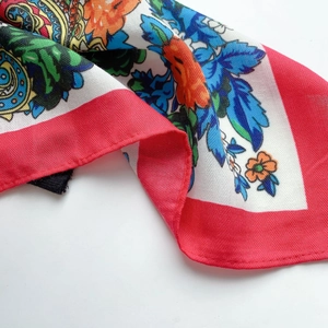 Ethnic paisley print red silk scarf for women featuring floral pattern and twill texture