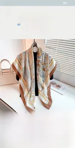 Detail of 110cm oversized square silk scarf featuring ethnic floral and herringbone pattern
