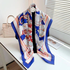 Detailed pattern view of the colorful ethnic shawl with a camellia decorative buckle