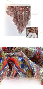 Detail of colorful paisley polyester scarf showing intricate ethnic patterns and smooth texture