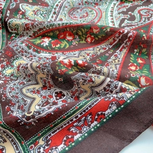 Close-up of bohemian paisley floral pattern on soft velvet-touch large square scarf