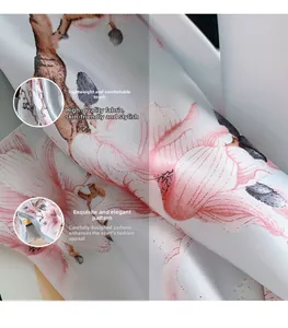 Close-up of lightweight silk scarf featuring delicate hand-painted pink magnolia patterns