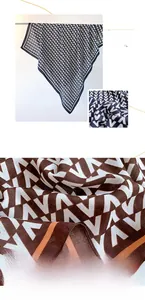 Detail view of skin-friendly geometric pattern scarf showing high-quality polyester texture