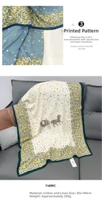Detail of floral print scarf with carriage motif on soft cotton linen fabric