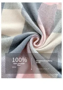 Detail shot of pink and grey plaid scarf showing 100% polyester soft woven texture
