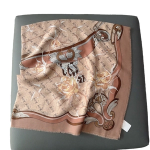 Elegant floral square scarf with interlocking G patterns and frayed fringe edges