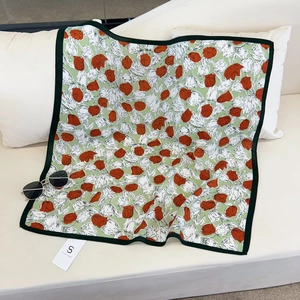 Green silk square scarf with red tulip flower pattern and elegant dark green border