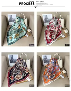 Detail of vintage floral pattern silk scarves in four colors on an elegant leather background