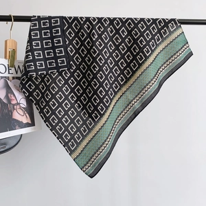 Classic herringbone patterned square scarf with geometric G-monogram and blue borders