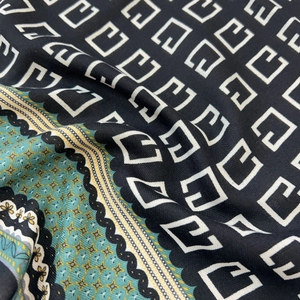 Herringbone small square scarf with geometric print and green border details