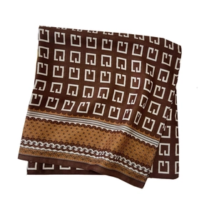 Brown herringbone square scarf with geometric patterns and soft cotton touch finish