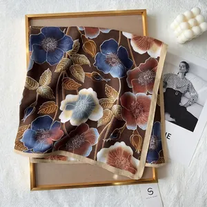 Elegant cotton-touch herringbone square scarf with floral print on brown background