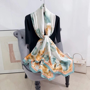 Sciarpa di seta floreale crema con stampa astratta blu-arancio e bordo elegante