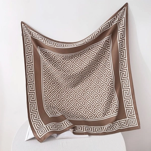 Detail of 90cm square silk scarf with coffee and cream Greek Key geometric pattern