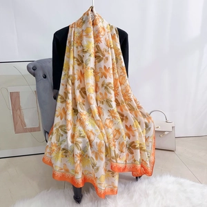 Summer silk satin long scarf with floral print and orange borders for beach travel