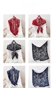 Detail view of 90cm floral silk scarf in three colors styled on a white shirt