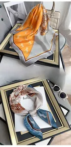 Detailaufnahme des Premium-Satintuchs mit Pferde- und Zebra-Prints in stilvollen Layouts