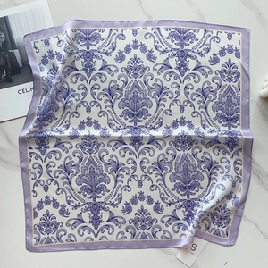 Detail of lavender Baroque damascus pattern on silk-like satin square scarf with border