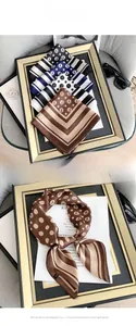 Detailed view of satin silk scarves with vintage polka dots and stripes on a magazine