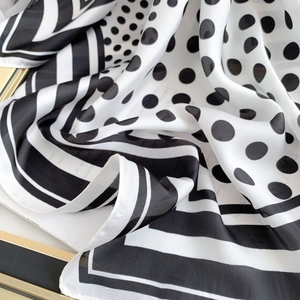Elegant silk square scarf with classic black and white polka dots and stripe pattern