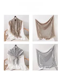 Detailed views of high-end geometric silk scarves in beige and monochrome patterns