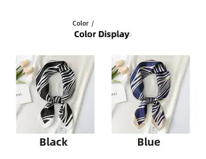 Detail of zebra pattern satin scarves in black and blue with elegant smooth texture