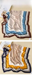 Detailed pattern of silk satin scarves with geometric diamonds and polka dots