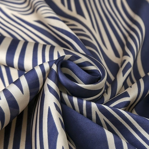 Elegant navy and beige zebra striped silk square scarf with glossy satin texture