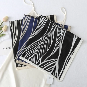 Elegant 70cm square silk scarf with stripe print styled on a white slip dress with flowers