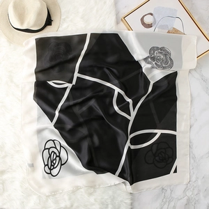Elegant silk-like scarf with black and white rose pattern and geometric lines for women