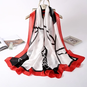 Elegant red rose silk scarf with abstract geometric floral patterns and red borders