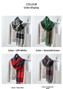 Detailed view of four colorful British style plaid tassel scarves on wool blazers