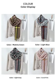 Detail view of retro houndstooth scarves with fringe in green, blue, gray and coral pink