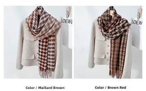 Detail of houndstooth scarves in Maillard brown and maroon with elegant fringe tassels