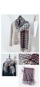 Detailed texture of houndstooth scarf with blue and rust red fringe tassels