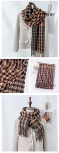 Detailed view of houndstooth scarf showing soft fringe and thick cashmere texture