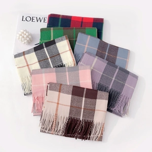 British style checkered plaid tassel scarves set in various colors on a white background