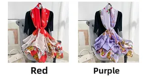 Close-up of floral print long scarves in red and purple featuring silk texture finish