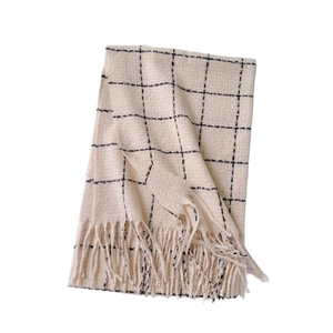 Classic black and white checkered cashmere-like scarf with warm beige base and fringe trim