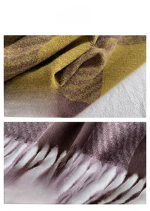 Macro detail of soft cashmere-like checkered scarf with tassel edges in mustard and brown