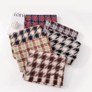 Classic houndstooth patterned scarves in soft cashmere-like fabric with fringe details